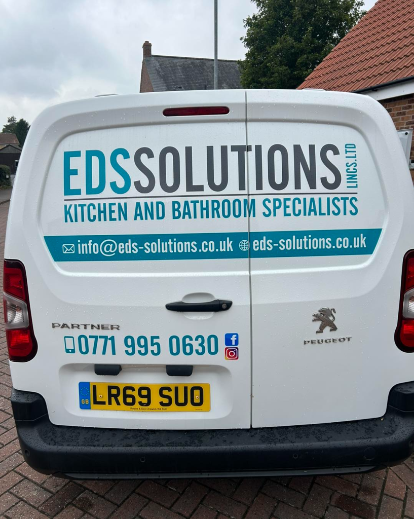 EDS Solutions van displaying contact for kitchen and bathroom specialists in the UK