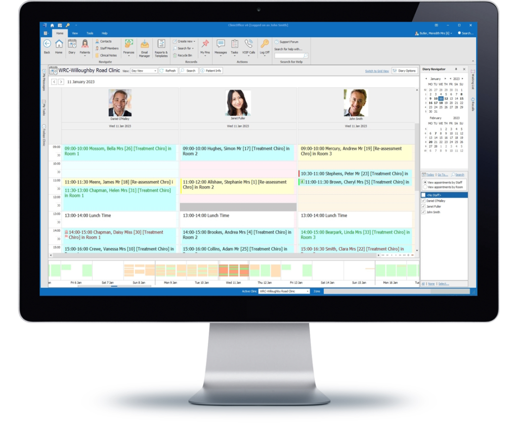 Clinic scheduling software displayed on a computer screen with appointments and staff management features visible